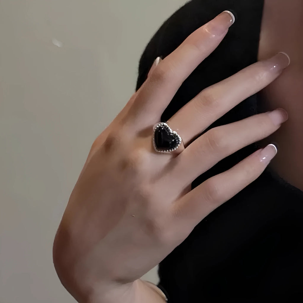 Open mouth adjustable sterling silver ring with black agate electroplated finish and heart design