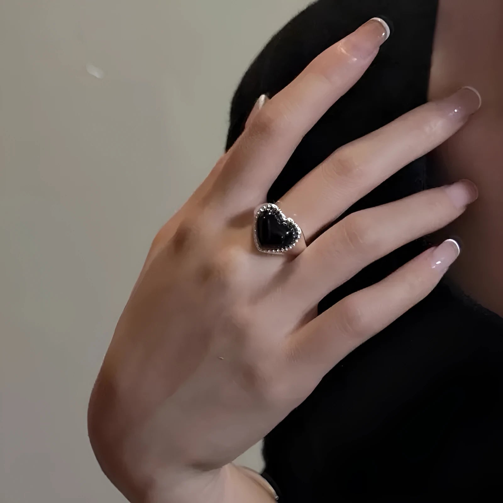 Open mouth adjustable sterling silver ring with black agate electroplated finish and heart design