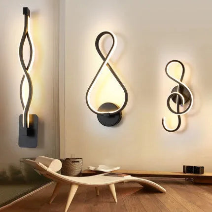 Nordic minimalist LED wall lamp with silicone shade in black finish on a white wall.