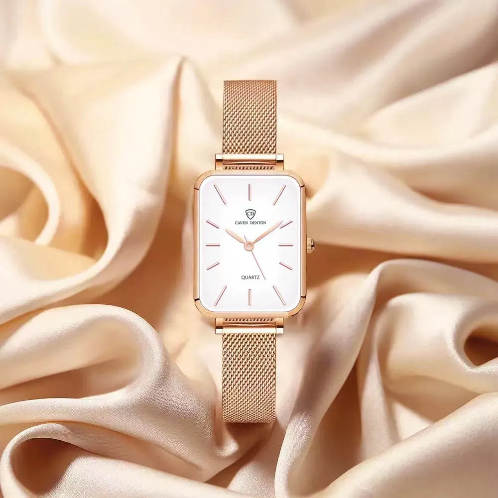 Women's rose gold quartz watch with woven steel strap and alloy case.