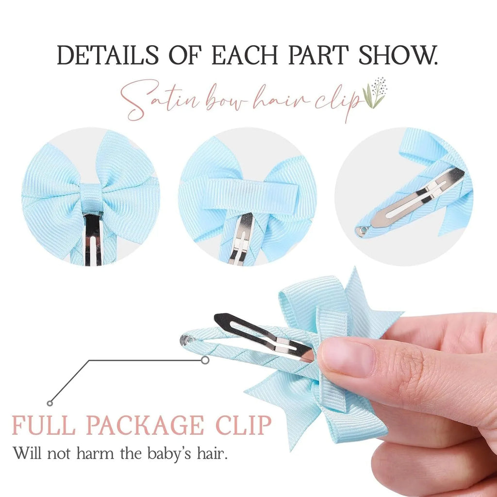 40 assorted colour grosgrain ribbon baby hair bow clips with fully wrapped snap barrettes on a white background.