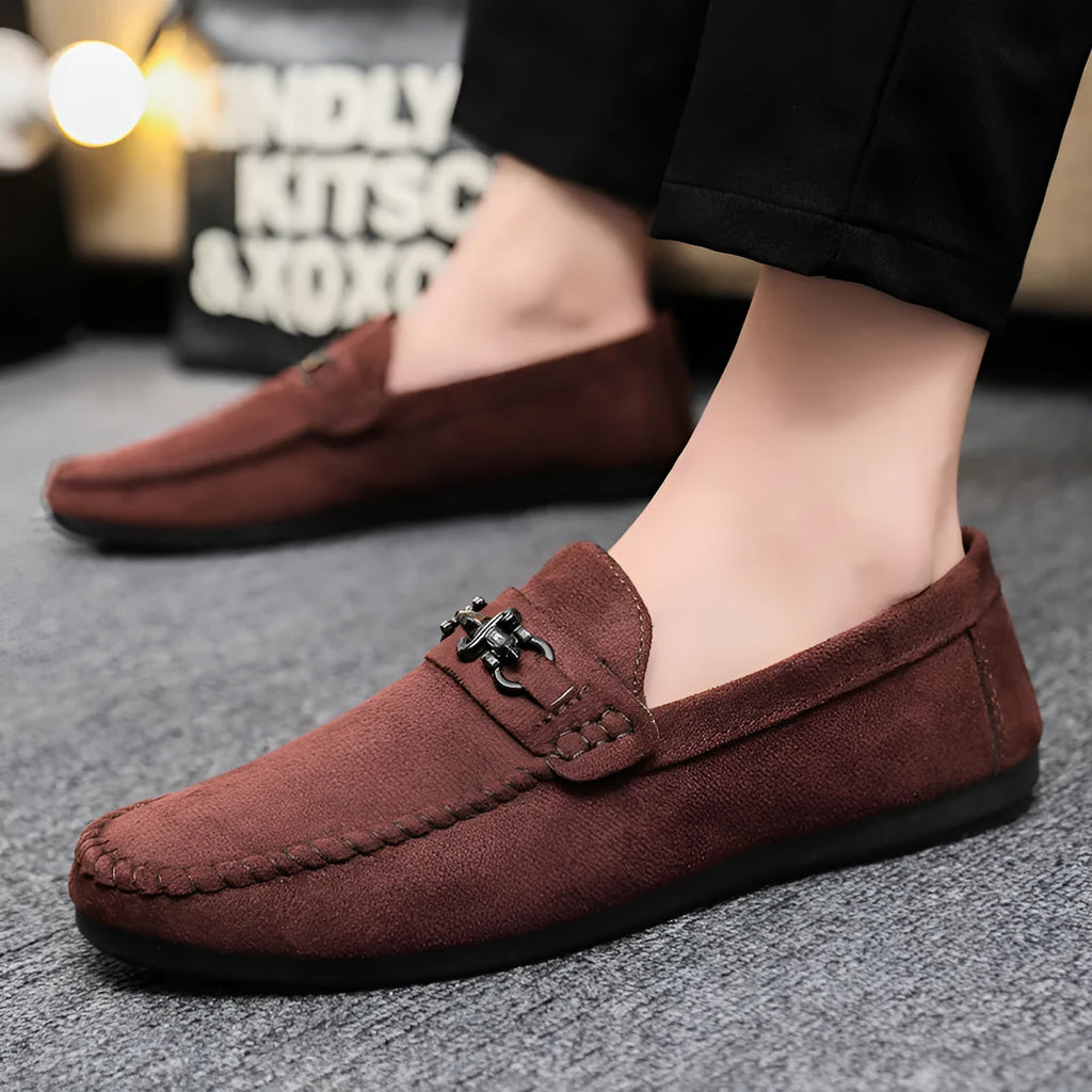 Waterproof men's slip-on loafers in black with round toe, low heel, and rubber sole