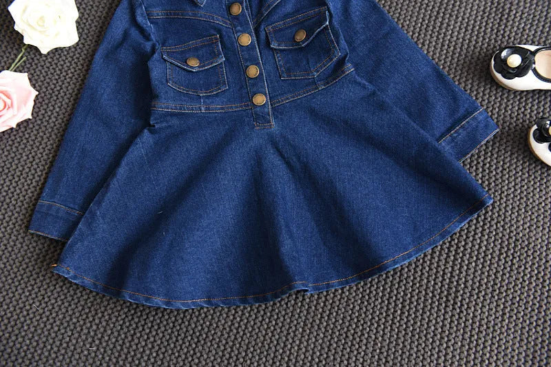 Girls navy denim dress with long sleeves and irregular skirt, cotton-rich fabric, sizes 100-140cm.