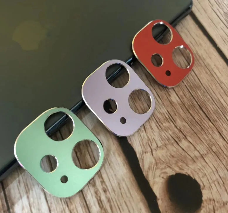 Metal phone grip ring in various colours attached to the back of an iPhone 11 Pro.