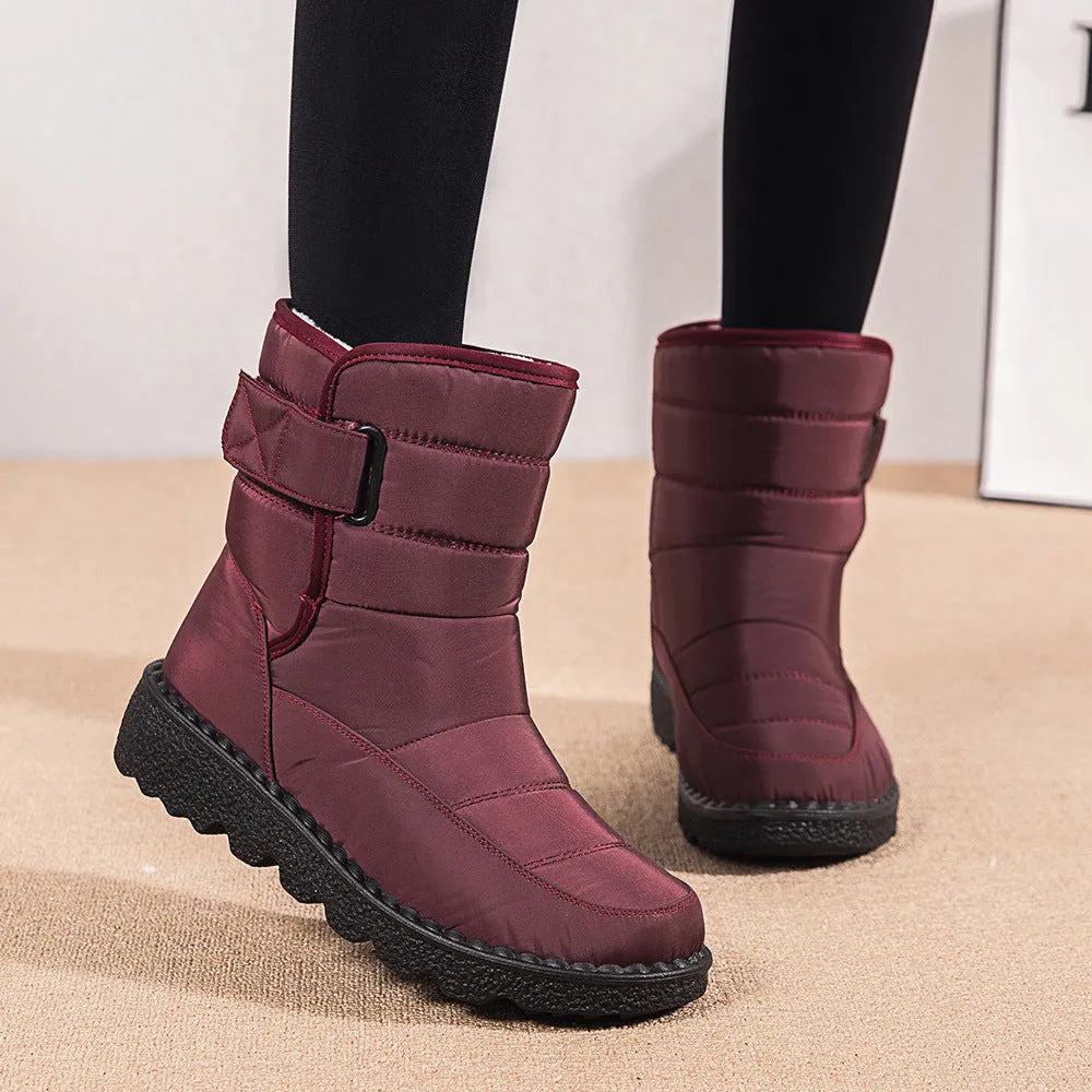 Women's waterproof snow boots with canvas upper, PU sole, buckle closure, and belt decoration