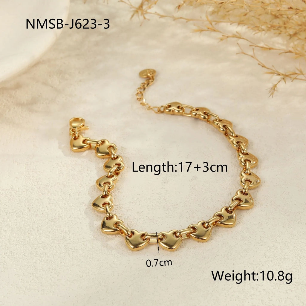 Women's stainless steel bracelet with hollowed-out geometric heart design in gold or steel colour