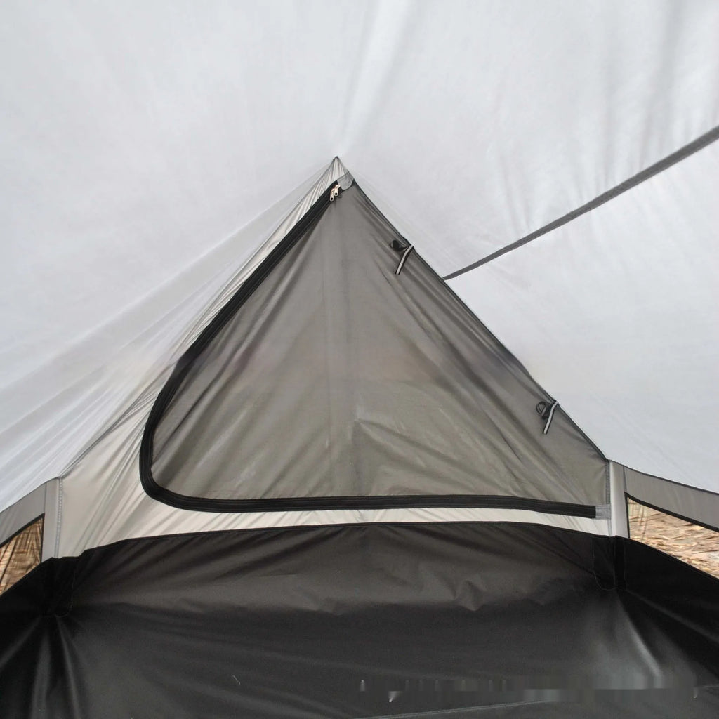 Brown and white pole-free A-line cabin tent for 2-3 people shown pitched with hiking poles.