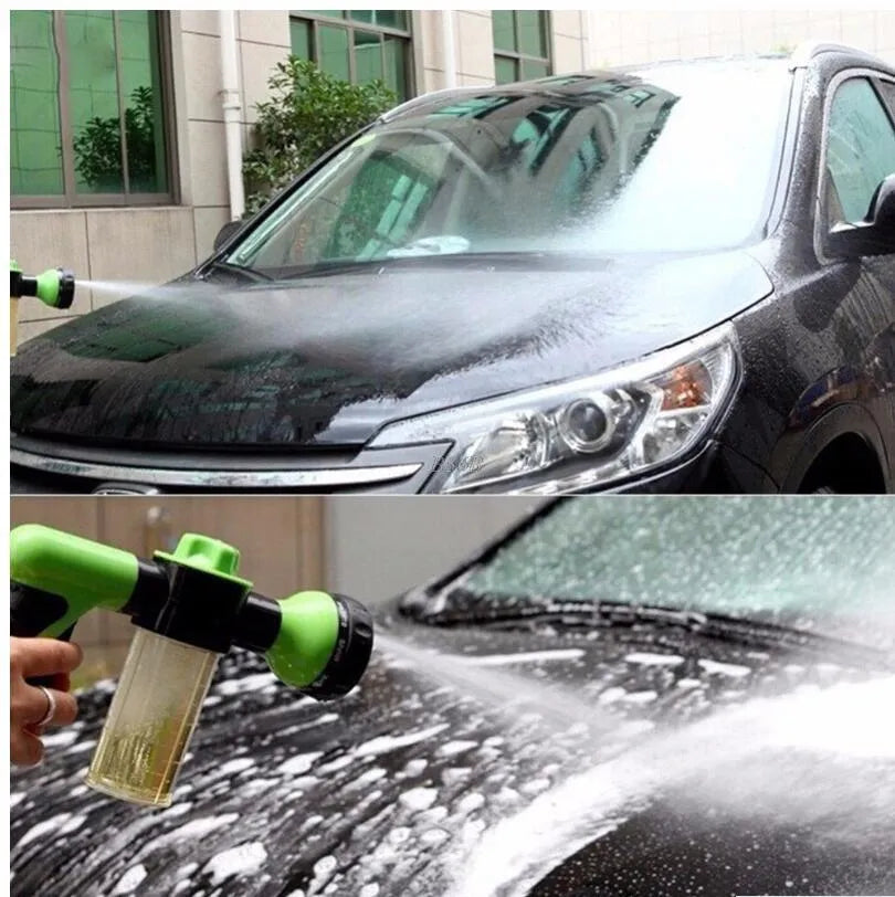 Green high-pressure foam spray gun for car washing with adjustable nozzle and attached water pipe.