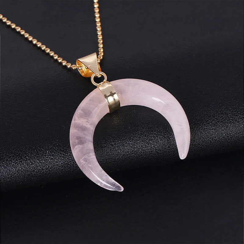 Natural stone moon pendant necklace with electroplated copper chain, shown in pink and purple colour options.