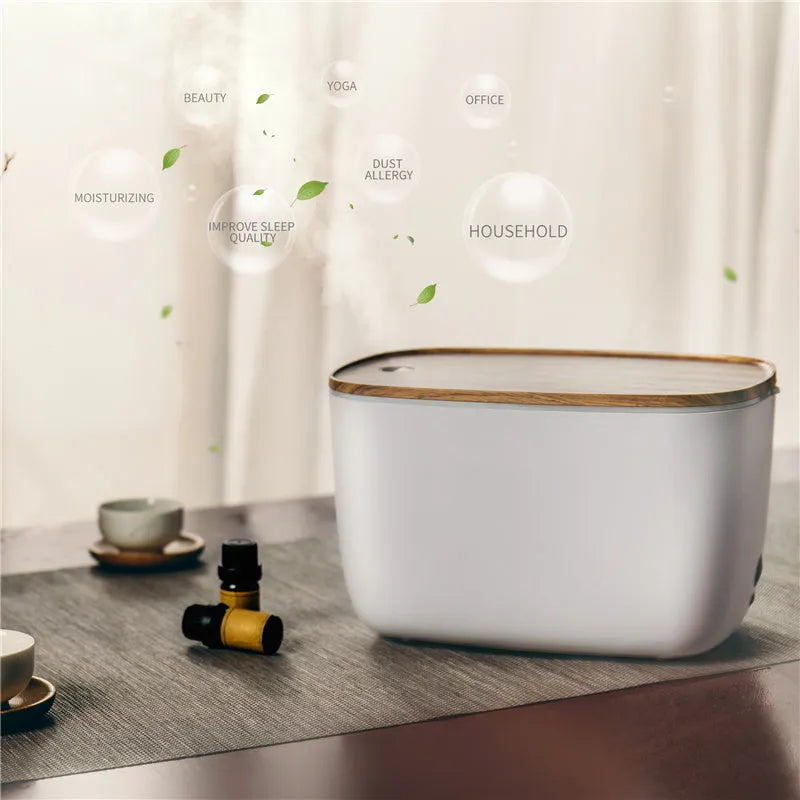 GX-22K household aromatherapy atomiser with 1.8L tank and night light on a wooden surface.