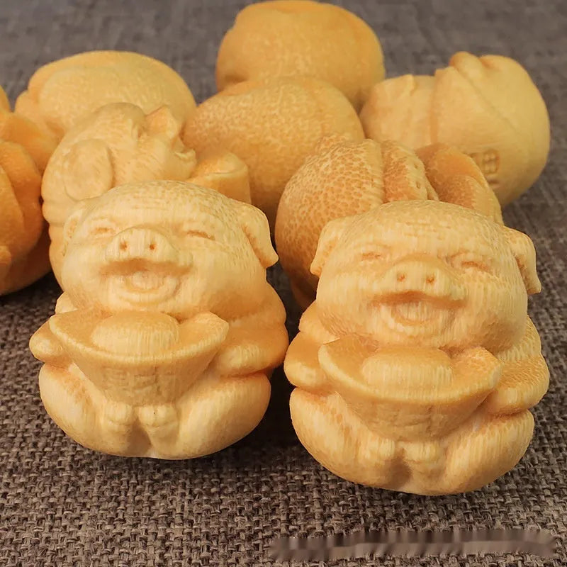 Solid bamboo carving ornament with cute pig design measuring 4cm tall