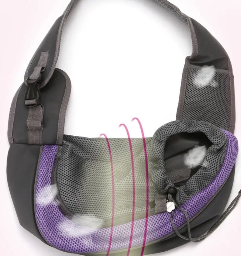 Blue pet carrier backpack for a small dog, showing padded interior and shoulder straps.