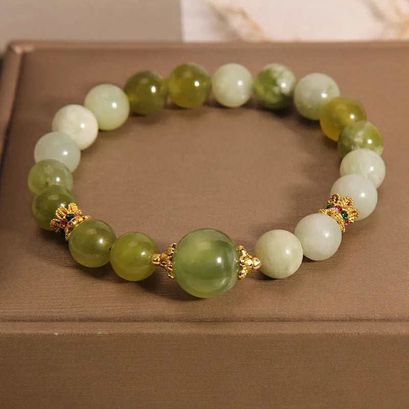 Women's original design bracelet made from green Xiuyan jade in a light luxury sweet Mori style.