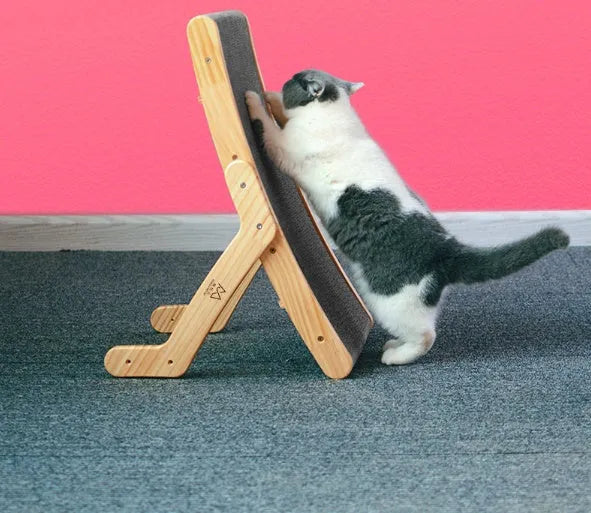 Deformation cat bed and scratcher in primary colour with corrugated paper surface, pine frame and three adjustable angles.