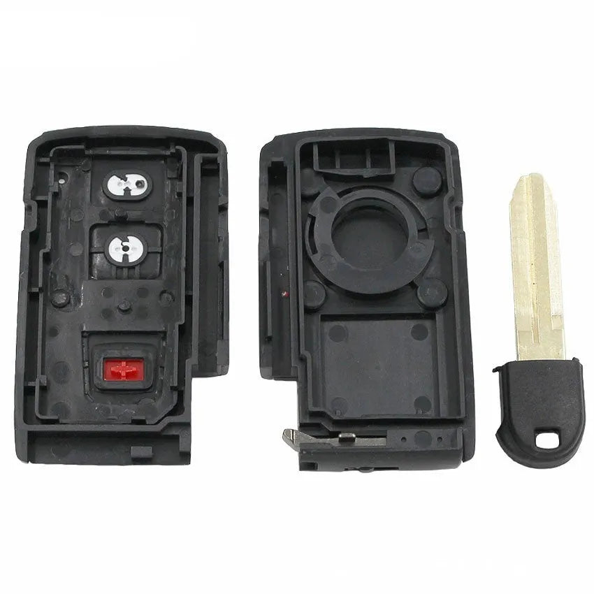 Black plastic car key shell replacement with small copper key blade measuring 70x38x20mm