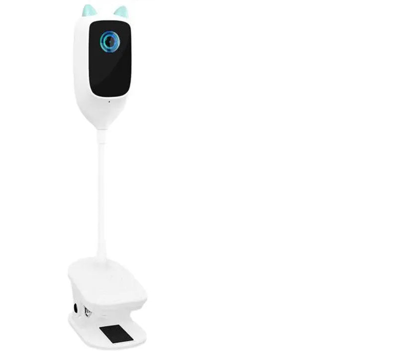 White smart baby monitor with 1080p HD night vision and 150 degree wide angle lens on a shelf