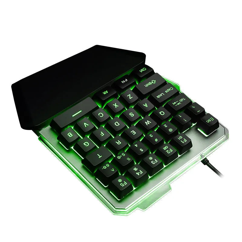 Black G40 Flow one-handed gaming keyboard with RGB backlit keys on a dark surface.