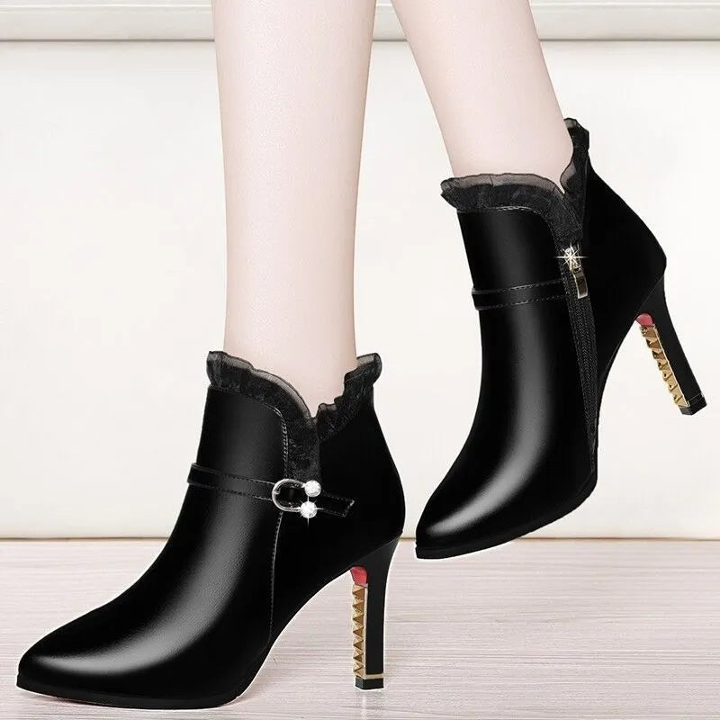 Women's over-the-knee black stiletto heel boots with side zipper and pointed toe
