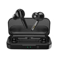 Black and white true wireless stereo earbuds with a charging case on a table