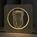Small tooth-shaped acrylic night lamp in wood colour finish with USB cable