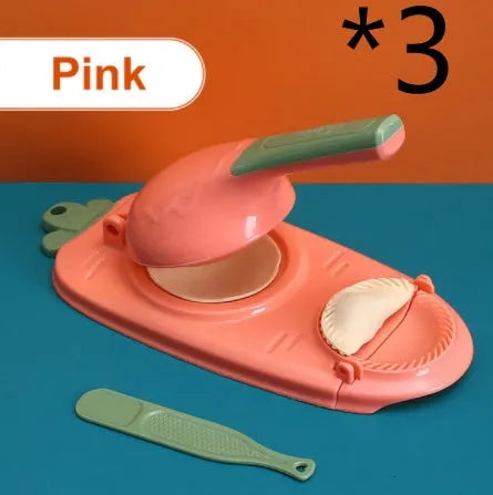 Orange and white manual dumpling skin press tool with ergonomic handle and hanging hole