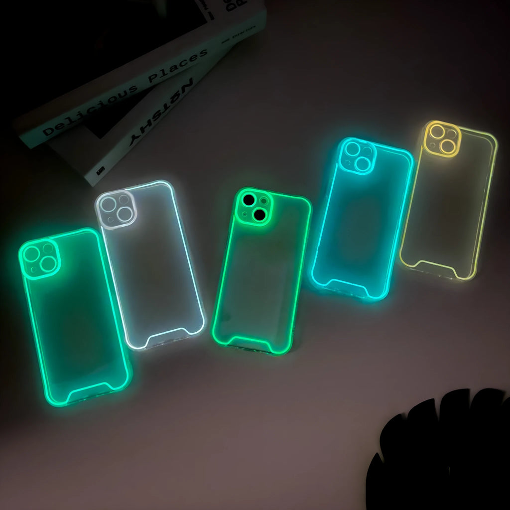 Glow in the dark soft TPU phone case for iPhone on a dark background, showing luminescent green colour.