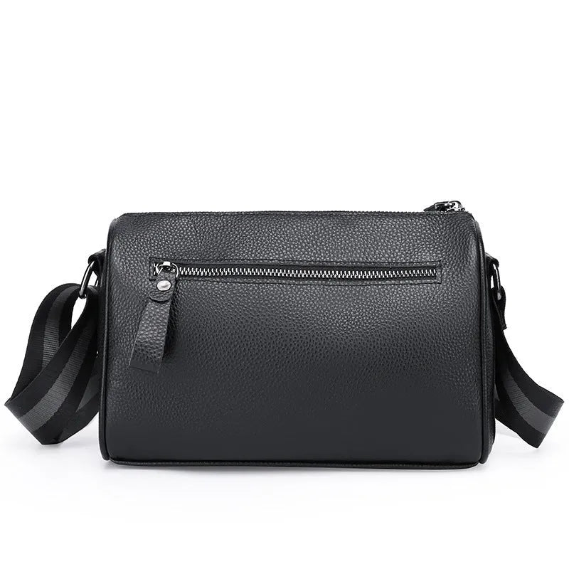 Black genuine leather crossbody bag showing 24x16x13cm dimensions with one-shoulder strap