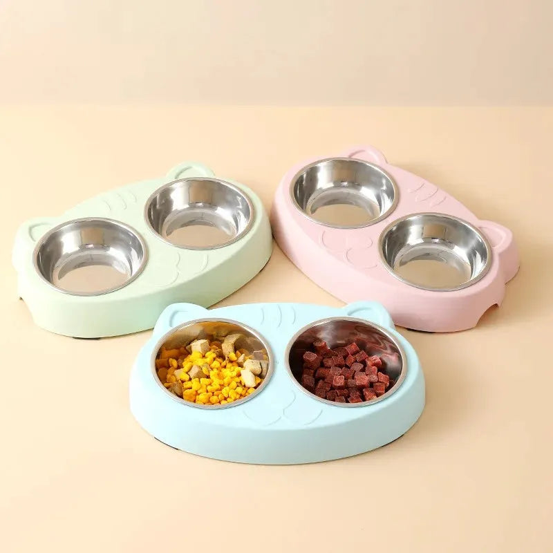 Blue macaron-shaped plastic pet feeder with two bowls and adjustable height legs