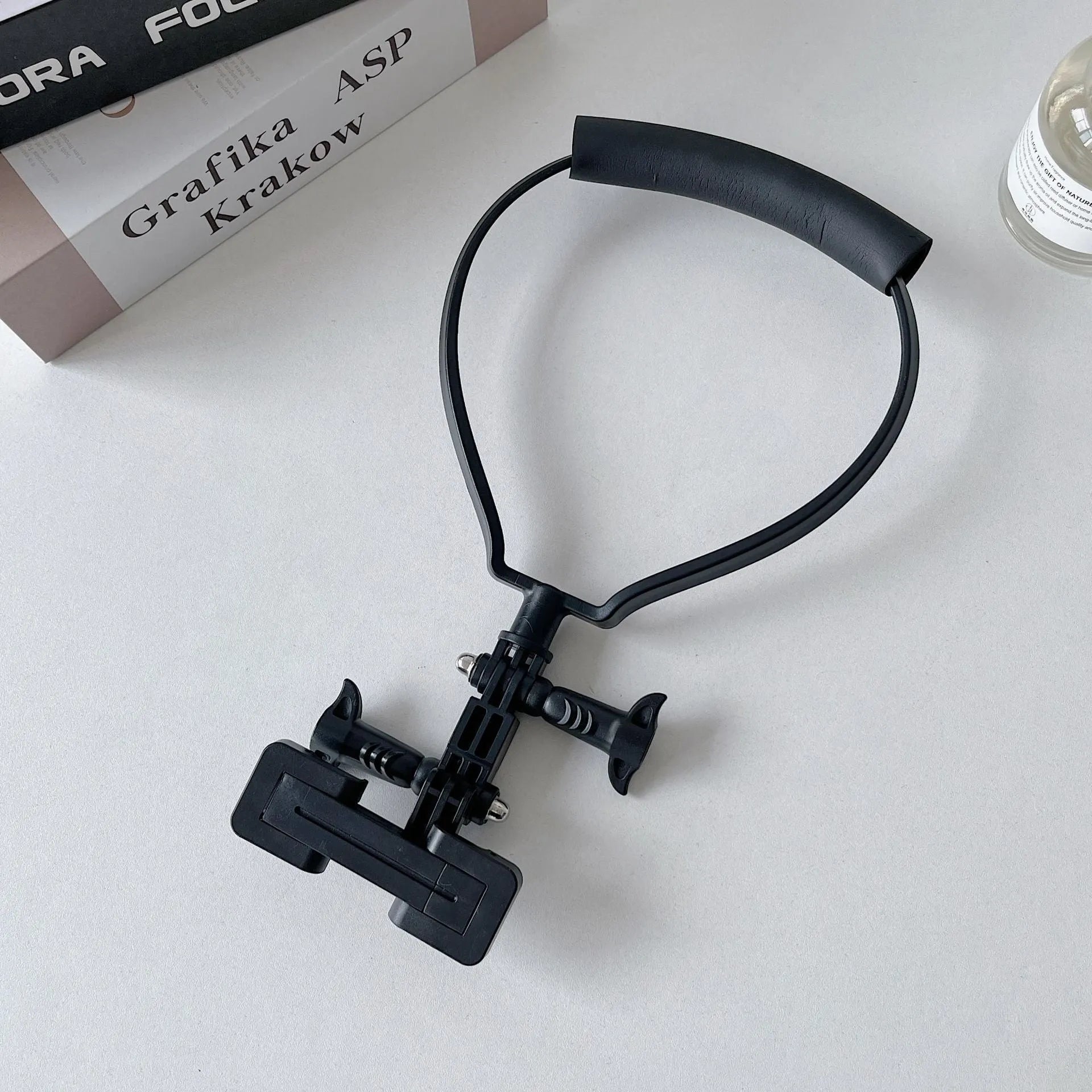 Black plastic universal cell phone neck hanging bracket with horizontal and vertical rotating clip and extension piece