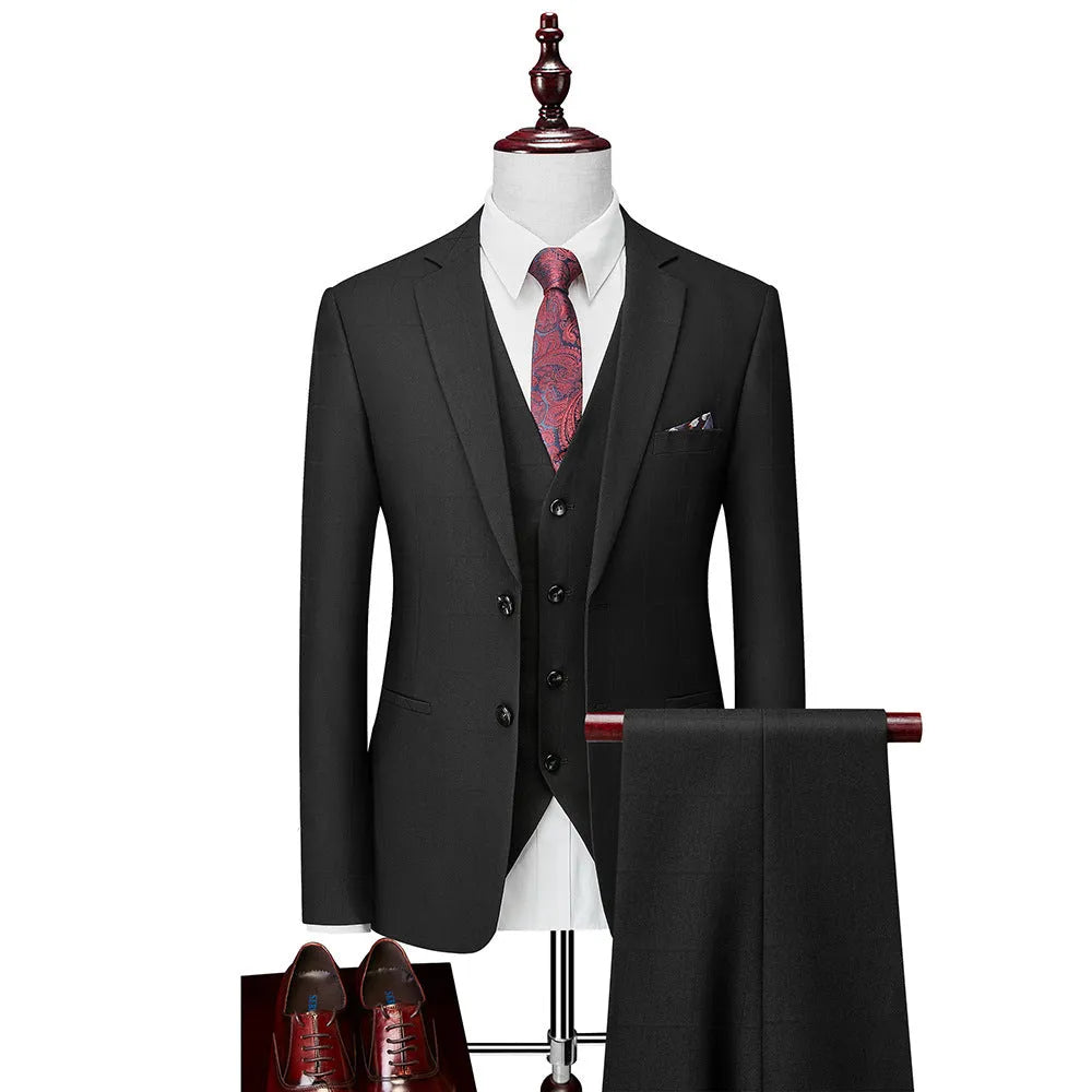 Men's navy blue plaid slim fit three-piece suit with jacket, vest and trousers on hanger