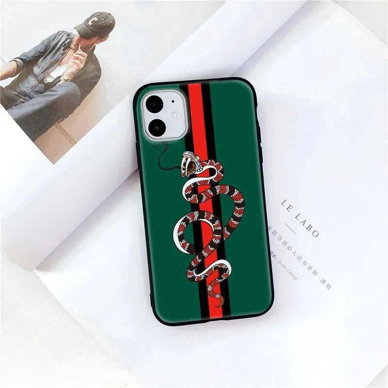 Black frosted silicone iPhone case featuring a cartoon snake design on the back.