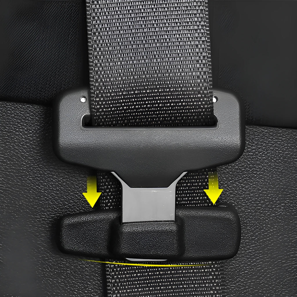Two black ABS plastic car seatbelt adjustment clips packaged in a clear OPP bag.