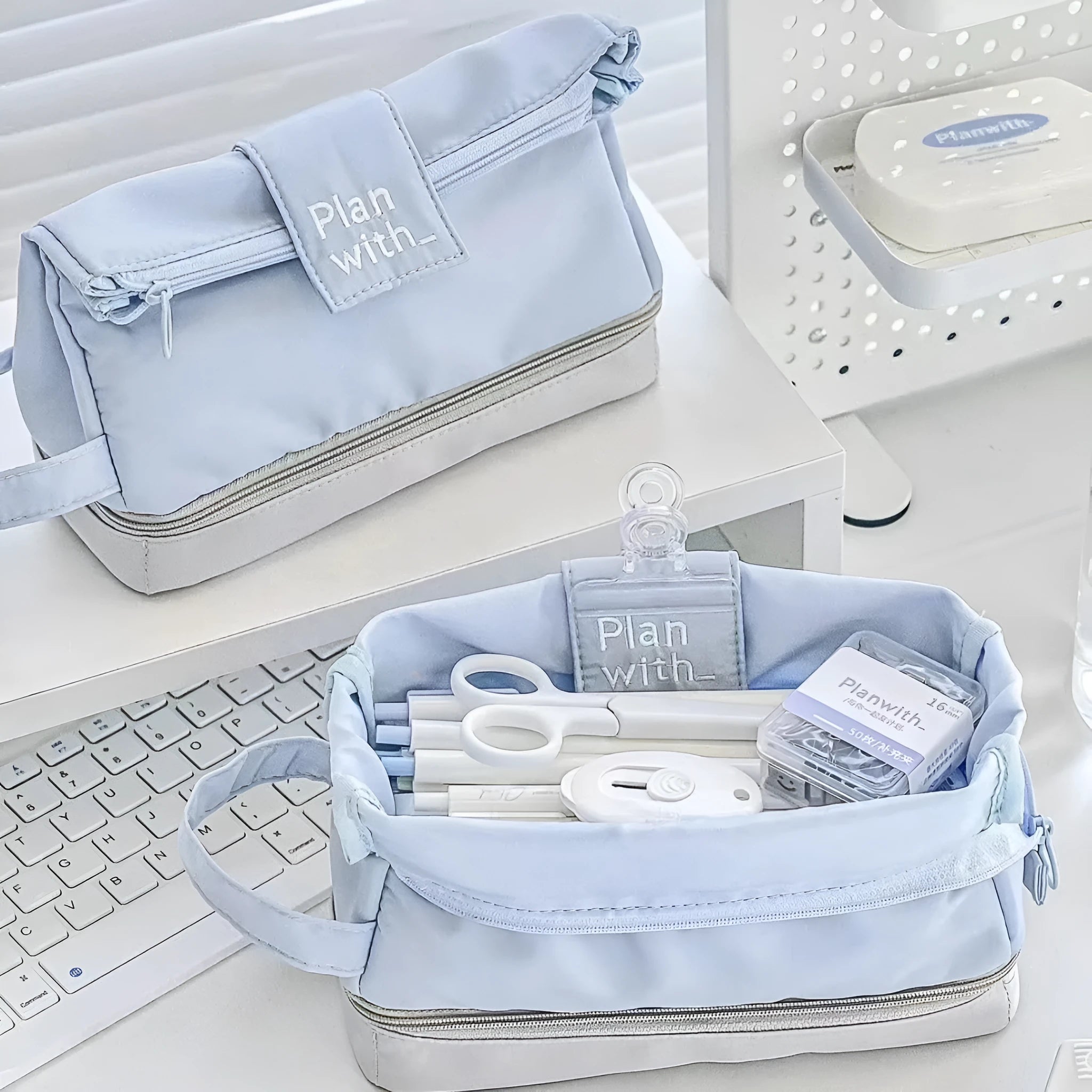 Folding double layer student pencil case in blue, navy blue, and cream white colours