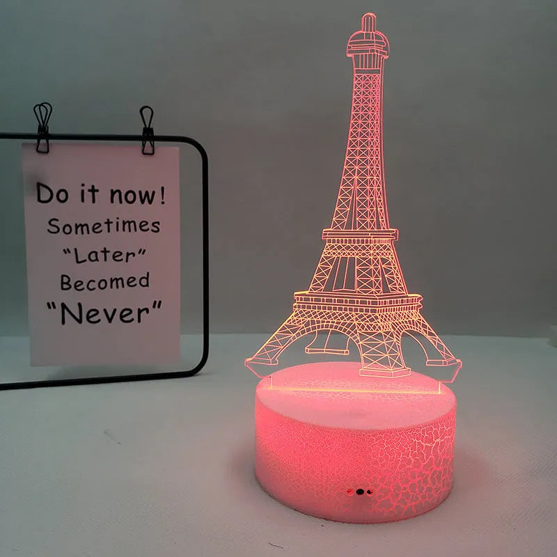 Eiffel Tower shaped table lamp with multi-colour 3D visual slide design and acrylic lampshade.