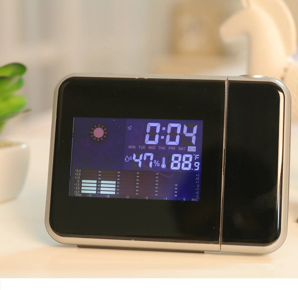 Home electronic clock with digital display and USB port, black plastic case, 16x6x12 cm size
