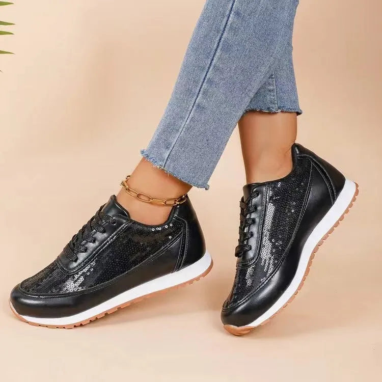 Women's black thick-soled casual sneaker with square toe and PU leather upper.