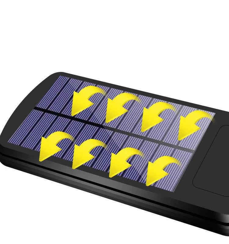 Black solar-powered outdoor motion sensor light with IP65 waterproof rating for garden and driveway security.