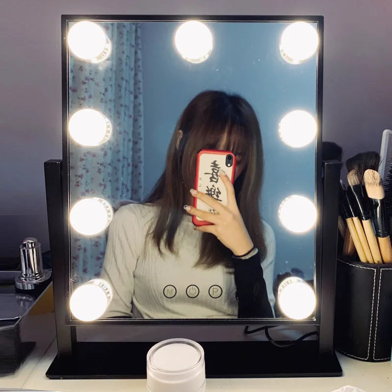 Black LED vanity makeup mirror with 9 bulbs mounted on a wall, 31x36cm