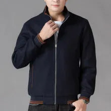 Men's grey woolen fleece autumn coat with long sleeves and size stick pockets on a sports style.
