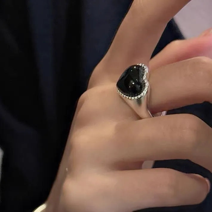 Open mouth adjustable sterling silver ring with black agate electroplated finish and heart design