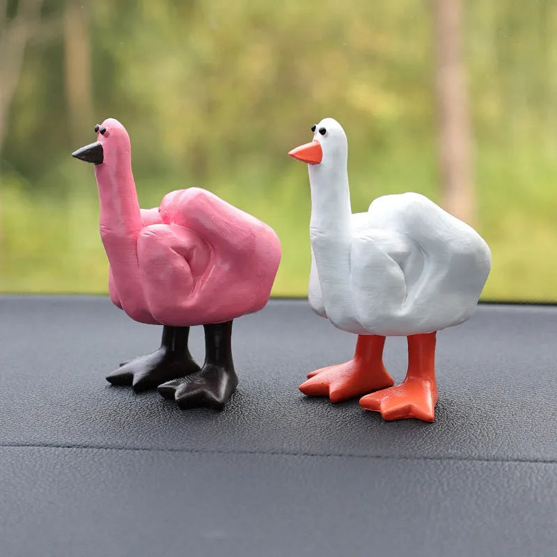 Creative vertical resin middle finger duck car ornament in pink on dashboard