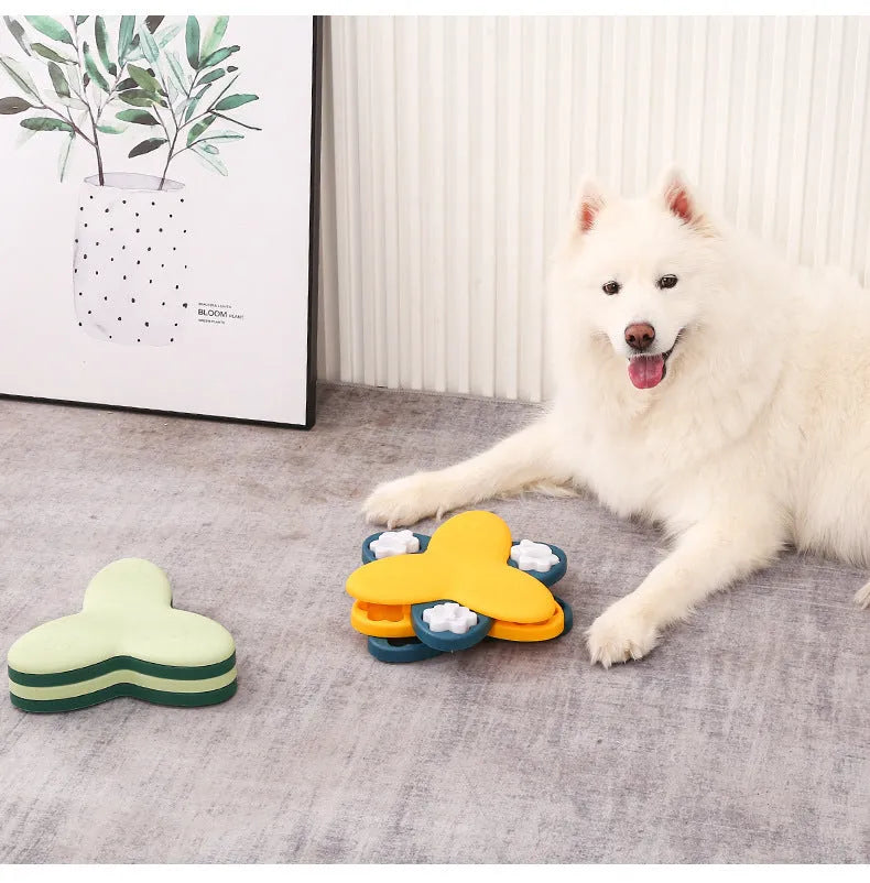 Green and yellow interactive dog puzzle toy slow feeder bowl with nine bone-covered compartments.
