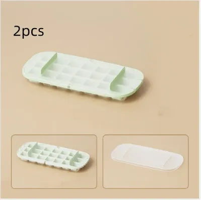 Food-grade high-capacity ice cube tray in blue with integrated storage for an ice shovel.