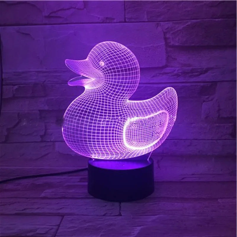 Yellow duck-shaped 3D acrylic night light with ABS base, showing multi-colour LED glow.