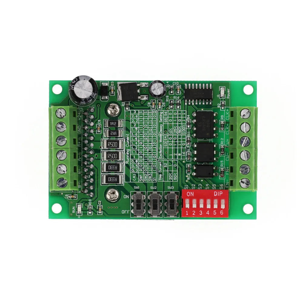 TB6560 stepper motor driver module on a green PCB with aluminium heatsink and screw terminals.