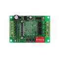 TB6560 stepper motor driver module on a green PCB with aluminium heatsink and screw terminals.
