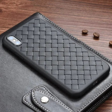 Luxury grid weaving protective case for iPhone on a table, showing raised lips and colour options.