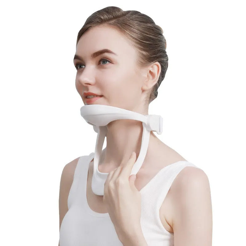 White PP plastic neck brace for cervical spine support shown on a grey background.