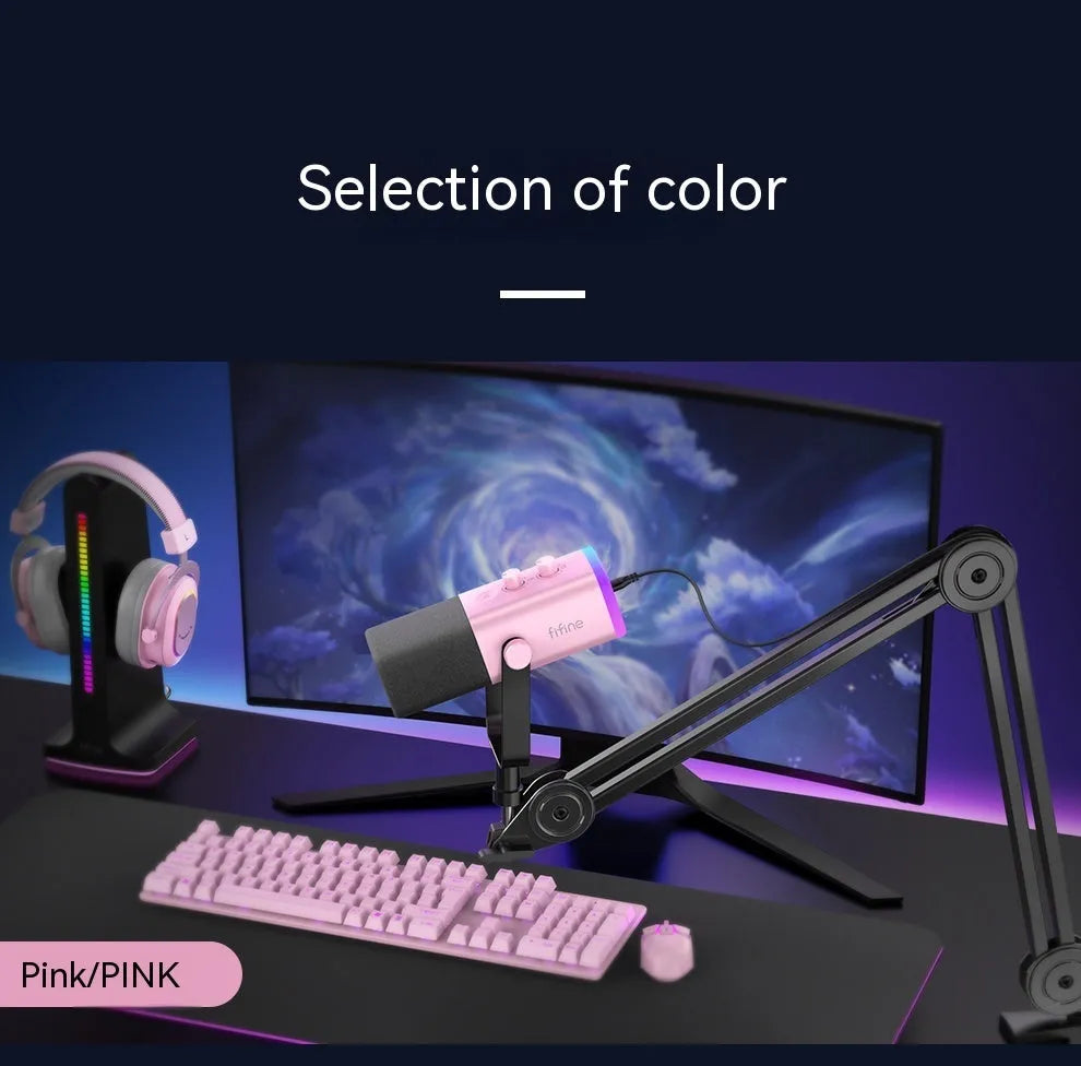 Black, pink, or white dynamic noise reduction microphone with XLR cable and base on a desk.
