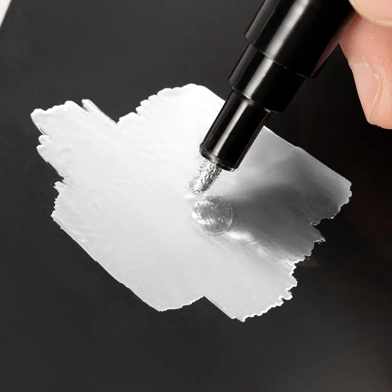 Waterproof mirror marker pen with plastic shell, shown with 1mm and 2mm tip options for glass writing.